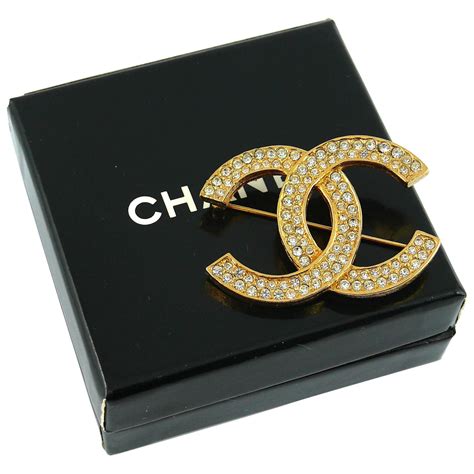 chanel vintage cc brooch